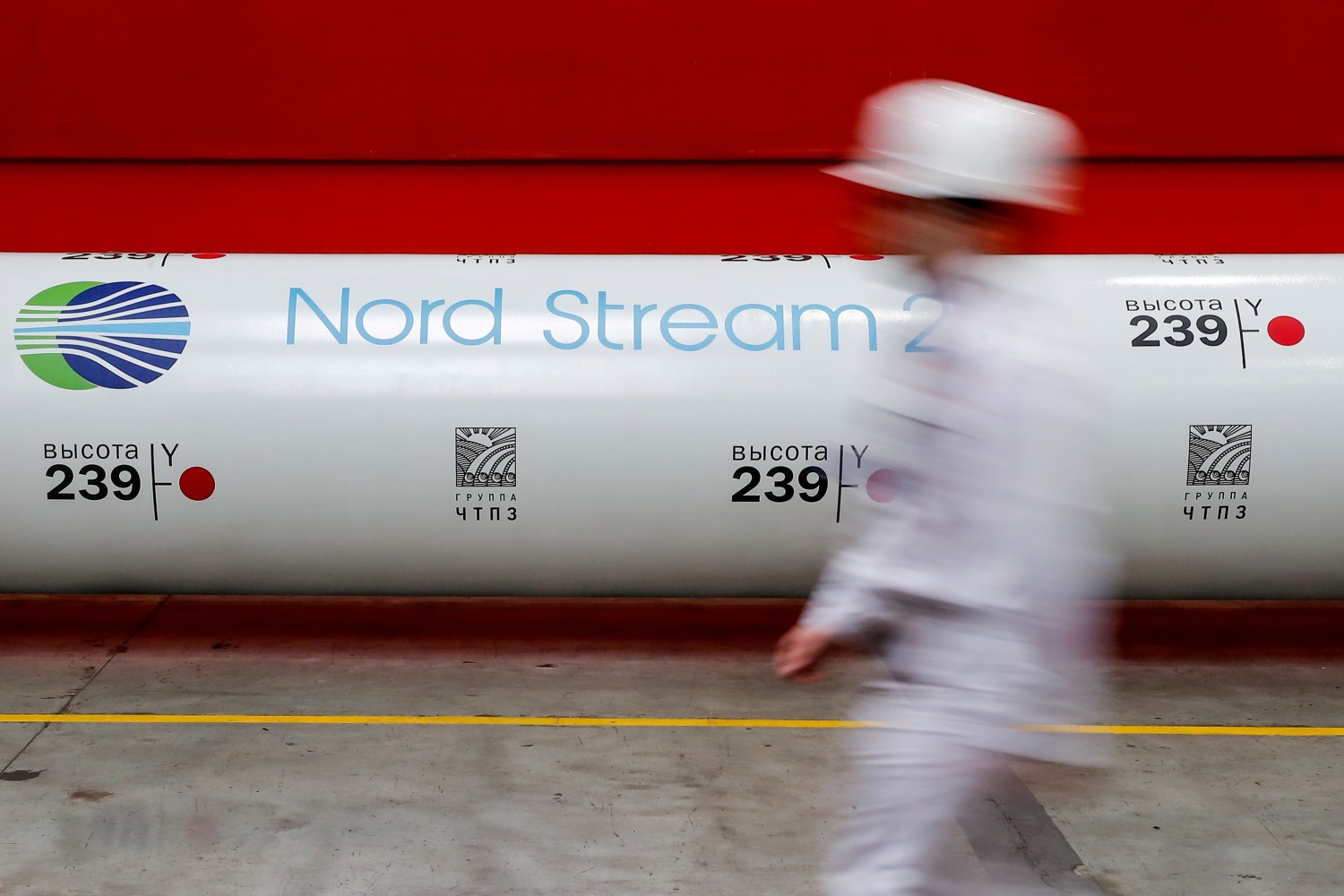 The logo of the Nord Stream 2 gas pipeline project is seen on a pipe at the Chelyabinsk pipe rolling plant in Chelyabinsk, Russia, February 26, 2020. Reuters/Maxim Shemetov/File Photo