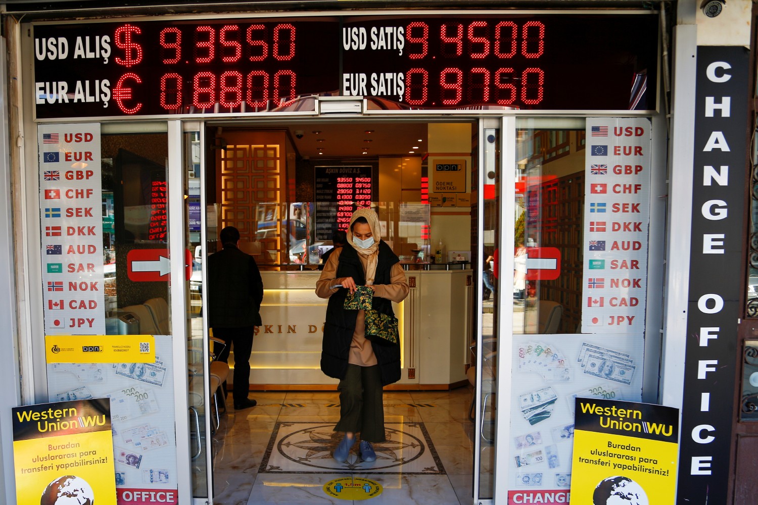 A customer leaves a currency exchange office in Ankara, Turkey, October 26, 2021. Reuters/Cagla Gurdogan