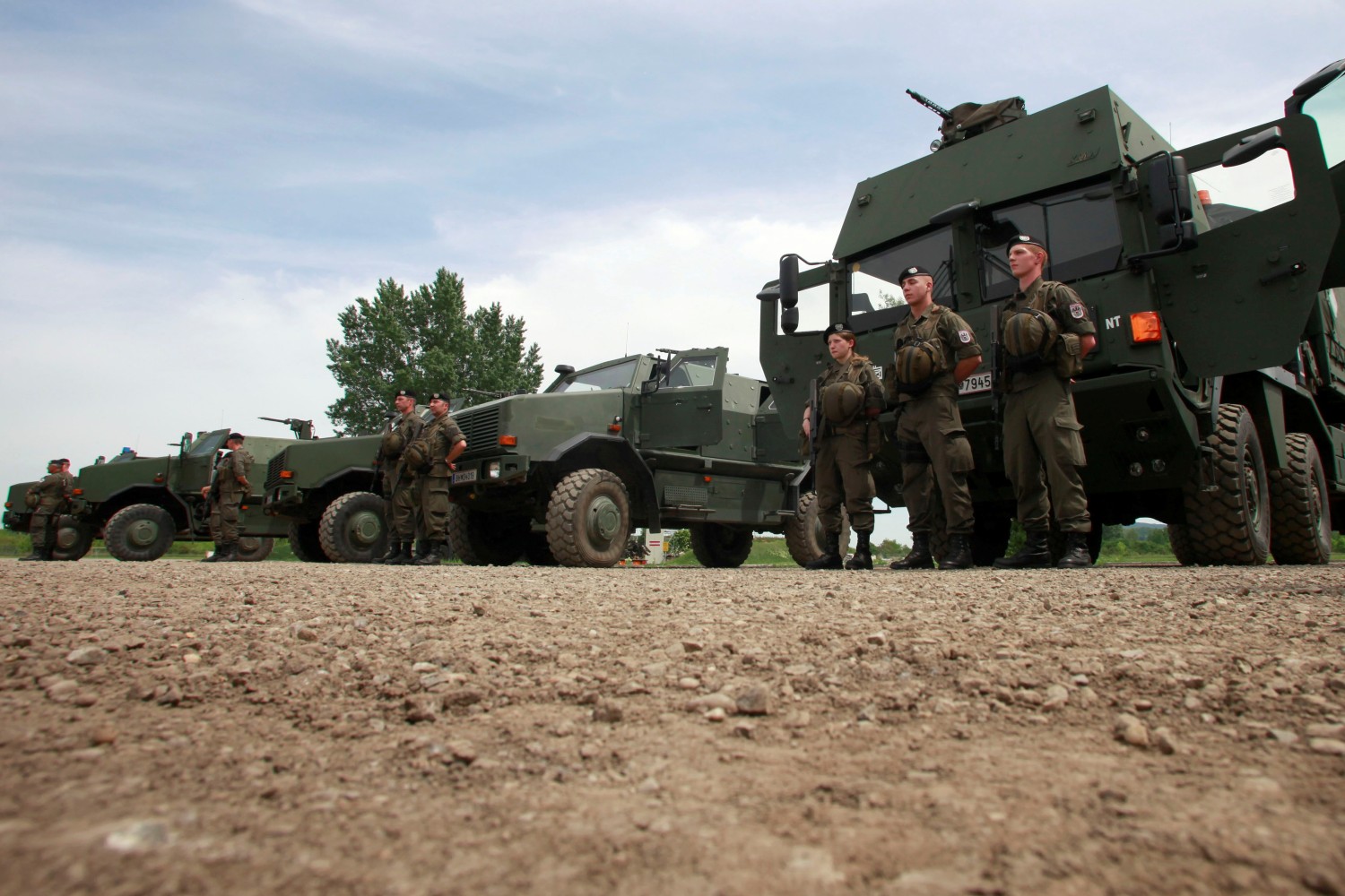 Members of the EU-Battlegroup wait for Austrian Defence Minister Norbert Darabos as he visits their barracks in Mautern about 60 kilometres (38miles) west of Vienna May 11, 2012. Reuters/Leonhard Foeger/File Photo