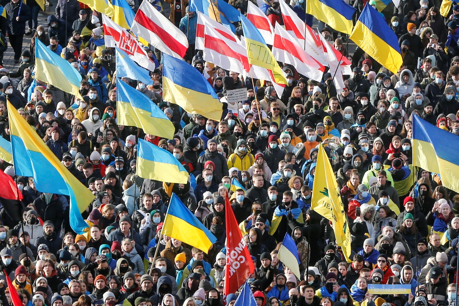 People take part in the Unity March, which is a procession to demonstrate Ukrainians' patriotic spirit amid growing tensions with Russia, in Kyiv, Ukraine February 12, 2022. Reuters/Valentyn Ogirenko