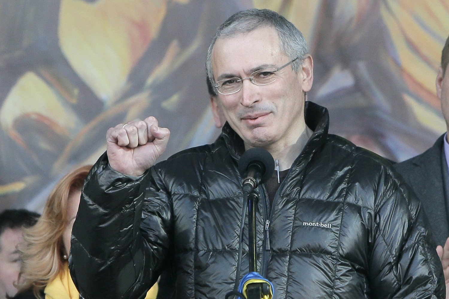 FILE - In this March 9, 2014 file photo, Russian former oil tycoon Mikhail Khodorkovsky cheers people during a rally in Independence Square in Kiev, Ukraine. A Dublin judge ordered authorities on Wednesday, Dec. 7, 2016, to unfreeze 100 million euros ($107 million) in cash belonging to Khodorkovsky, ruling that police had provided no evidence that the funds were illegally gained as Russia contends. (AP Photo/Efrem Lukatsky, File)