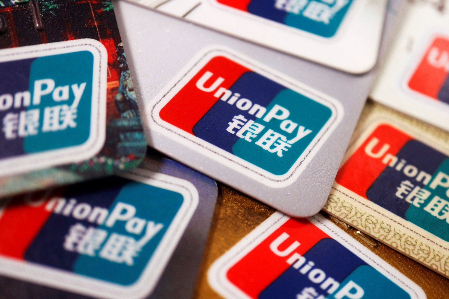 UnionPay cards are seen displayed in this illustration picture taken March 7, 2022. Reuters/Florence Lo/Illustration