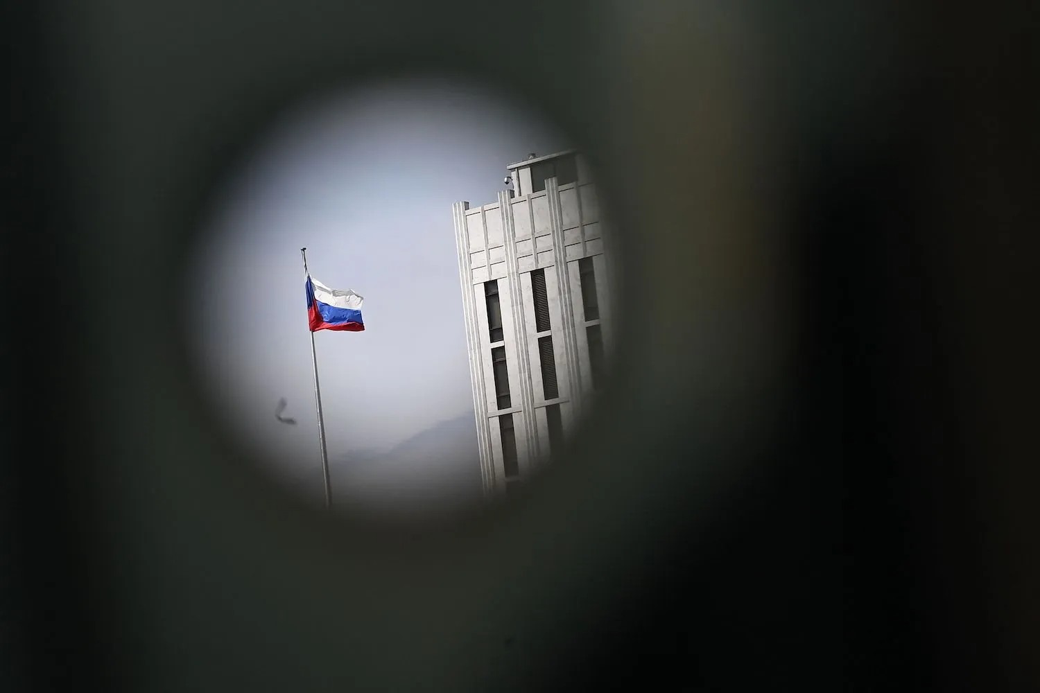 A Russian flag at the embassy of Russia is seen in Washington on April 15, 2021. MANDEL NGAN/AFP VIA GETTY IMAGES